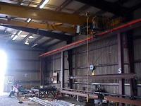 Typical used/refurbished, 5 ton capacity, top-riding, single girder crane with used/refurbished Shaw-Box low headroom hoist and used runway.