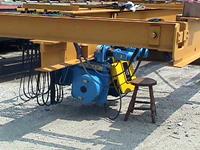Typical used/refurbished low headroom, underhung, single girder crane with unused surplus hoist.