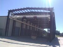 25 Ton, single girder (2 x 12.5 ton) x 55' span.